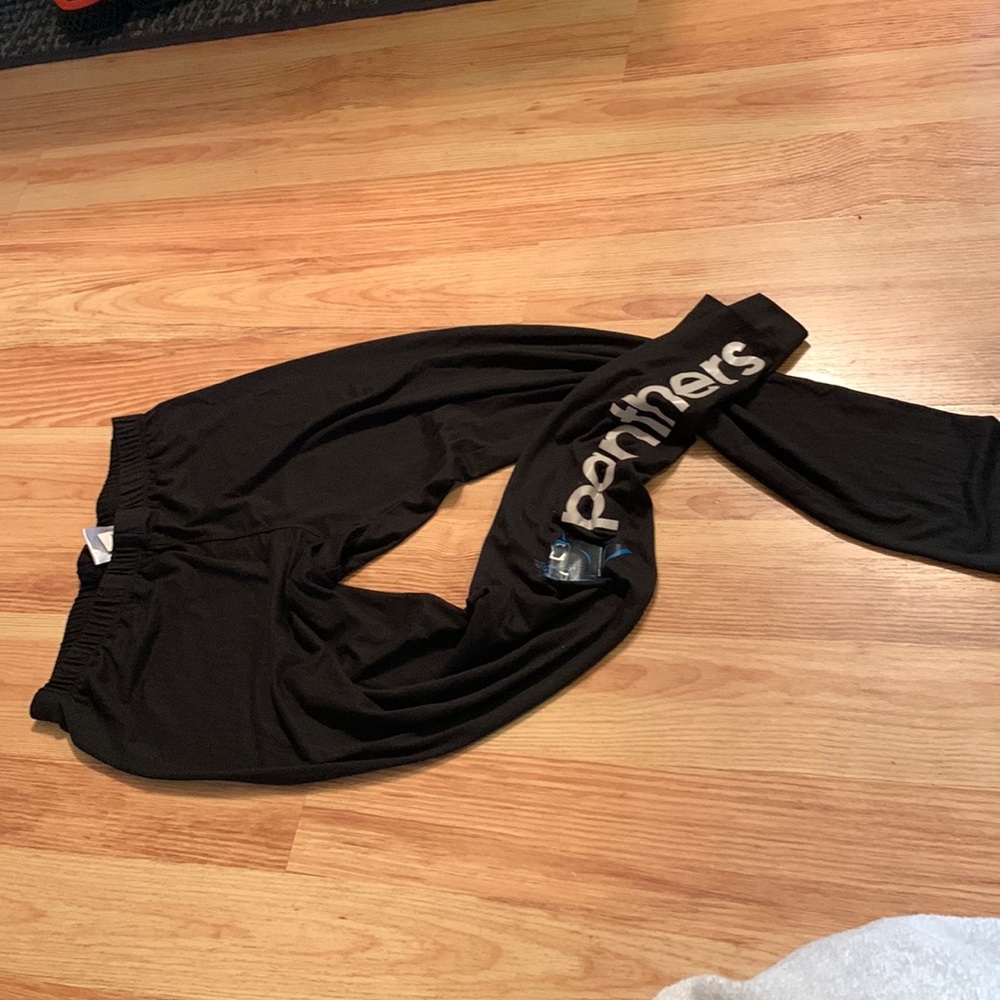 Thin fabric. Carolina panthers leggings. Size small
